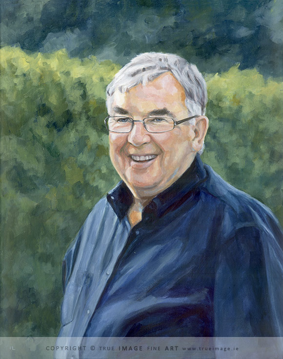 portrait of a father smiling standing in a garden